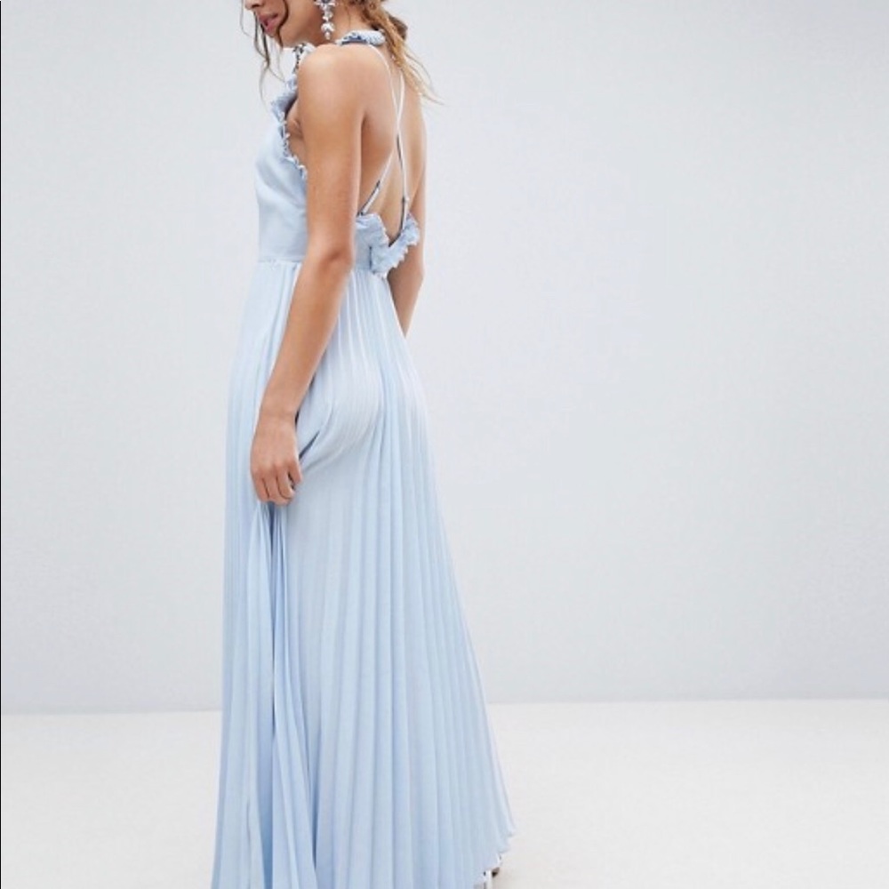 Beautiful pleated maxi with a ruffle open back